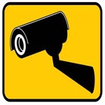 yellow and black cctv camera sign